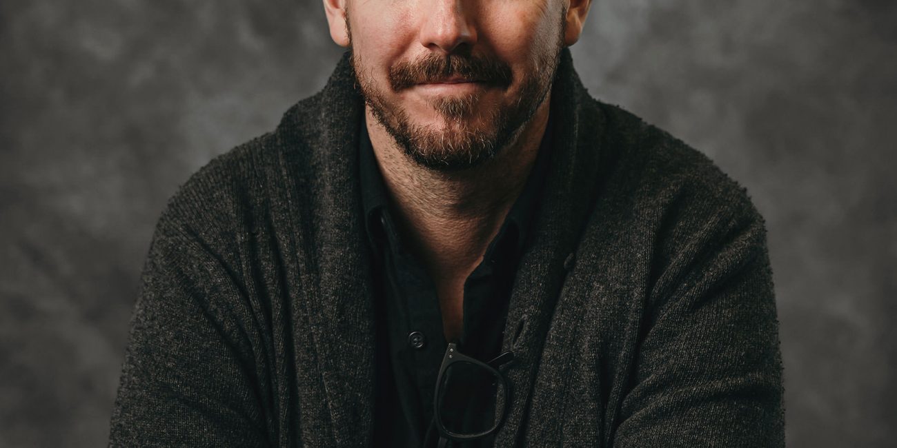 A headshot of Producer and Director Ryan Marley